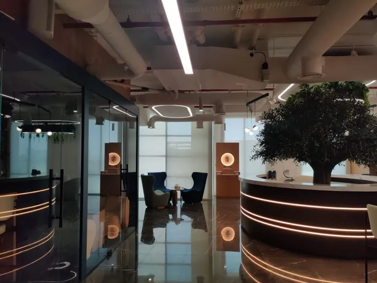 Curved bespoke reception desk in Dubai